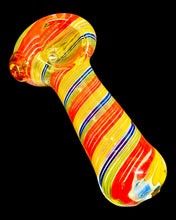 Load image into Gallery viewer, A Primary Pop Fumed Spoon Pipe in the dark, showing its fumed color-changing properties.
