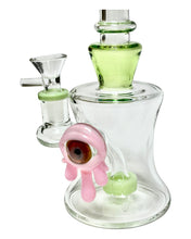 Load image into Gallery viewer, The base and circ perc of a green and pink Slimy Eye Color-Accented Bong.
