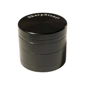 A black Sharpstone Flat Top Grinder 40mm.