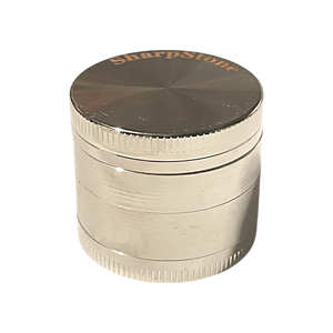 A silver Sharpstone Flat Top Grinder 40mm.