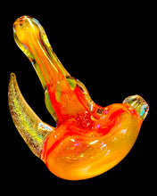 Load image into Gallery viewer, A TKO Glassowrks Fumed Dicro Horn Spoon Pipe in the dark.
